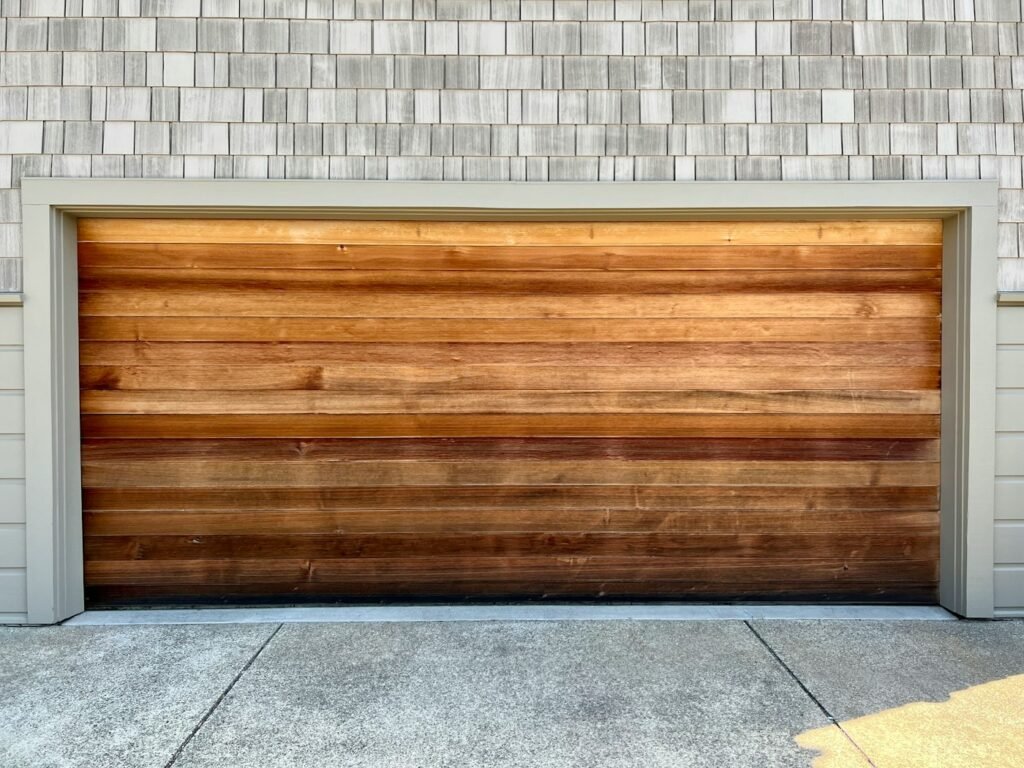 Timber-clad garage door on a modern building